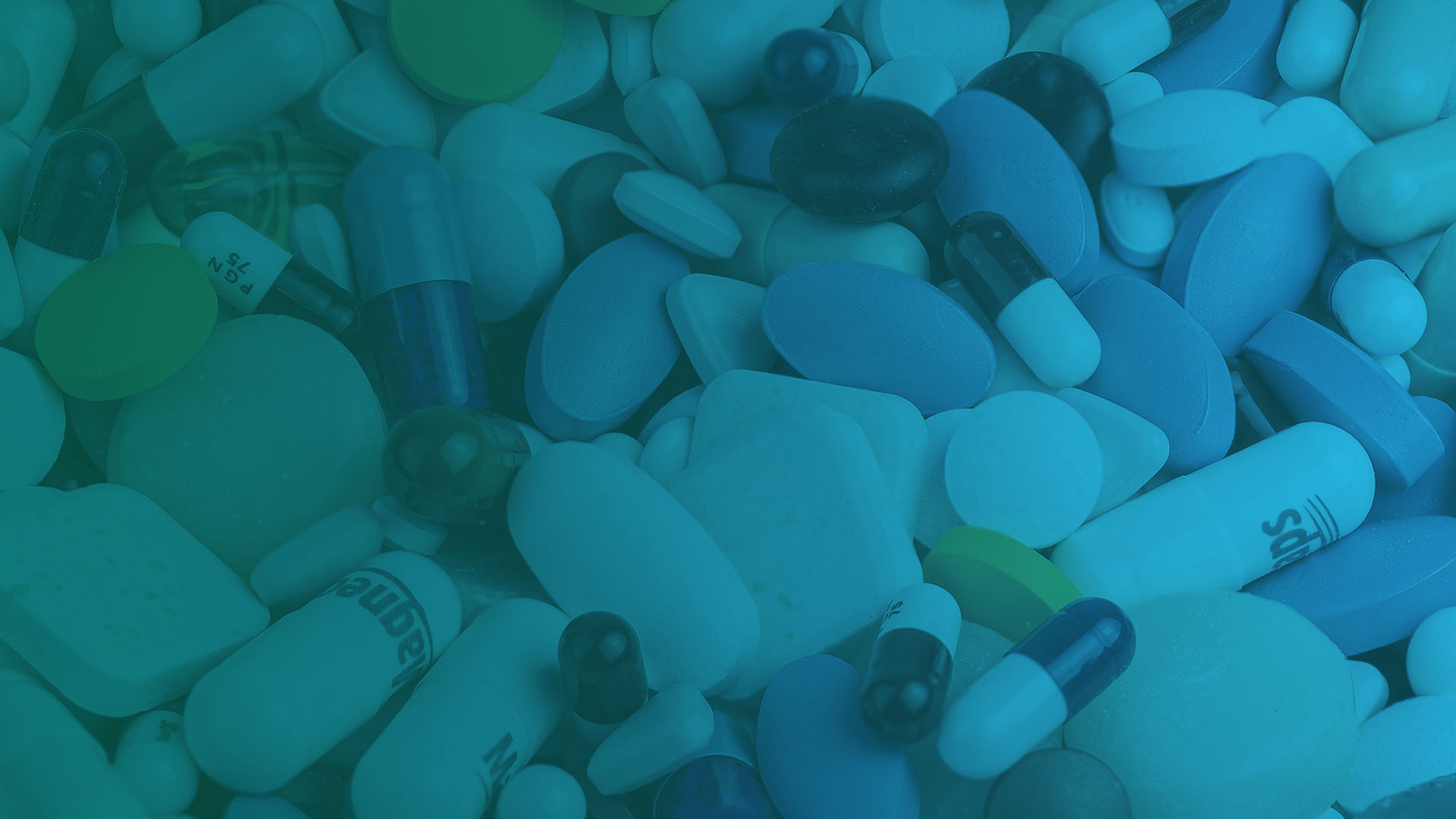 A teal tinted photo of a large pile of various pills.